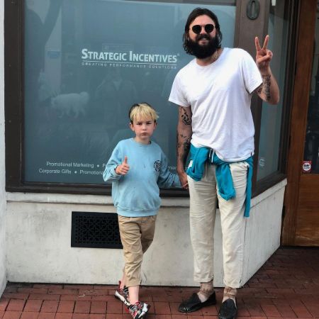 Nick Thune with his son.